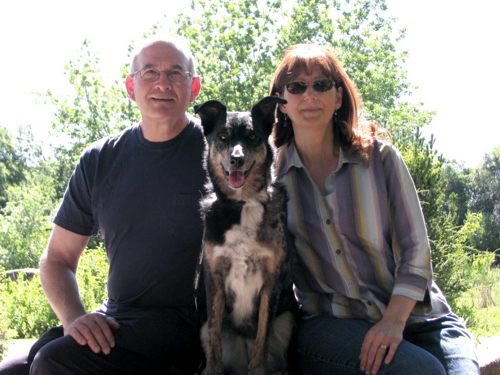 Family strengthening their bond with their dog during a quiet moment together.